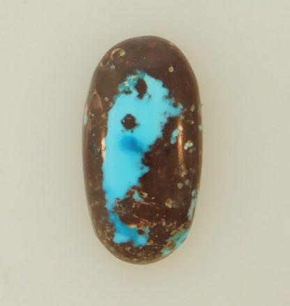 BLUE BISBEE TURQUOISE with blue and dark blue pools in dark brown host 20.5 carats